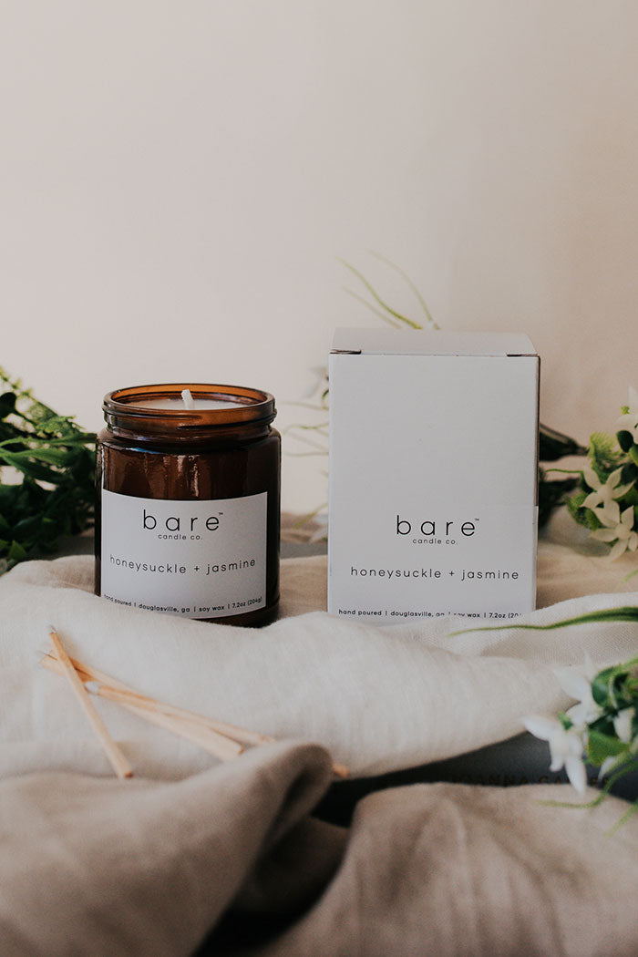 honeysuckle and  jasmine soy candle in our white box packaging